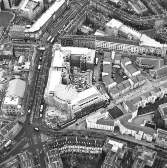 Oblique aerial view centred on Princes Exchange under construction, taken from the SE.