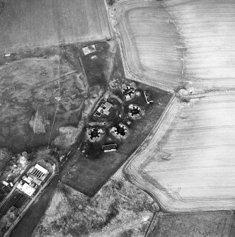 Oblique aerial view centred on the remains of an anti-aircraft battery, taken from the SW.