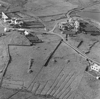 Oblique aerial view of Isbister, Whalsay.