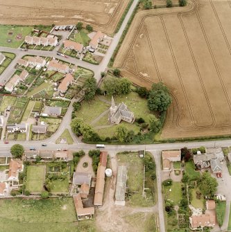 Oblique aerial photograph of East Saltoun centred on theParish Church and Graveyard, taken from the NE.