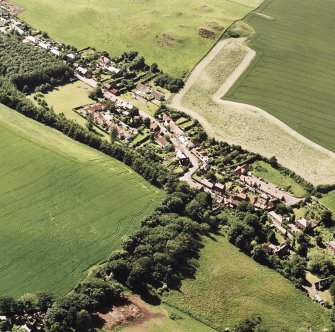 Oblique aerial view centred on the village, taken from the SE.