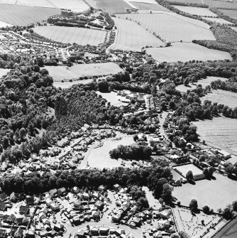 Oblique aerial view centred on the village of Easter Pencaitland with Wester Pencaitland and Maltings adjacent, taken from the ENE.