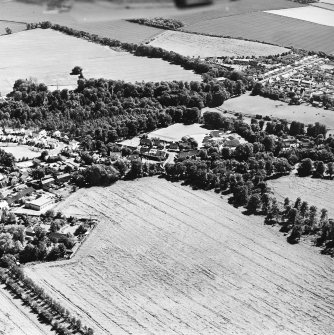 Oblique aerial view centred on the villages of Easter and Wester Pencaitland, taken from the NNW.