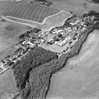 Oblique aerial view centred on the village, taken from the SW.