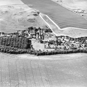 Oblique aerial view centred on the village, taken from the SSE.