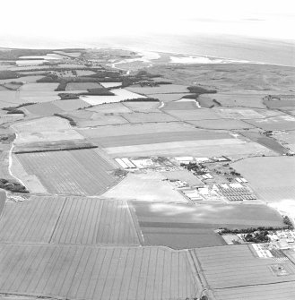 Oblique aerial view of Drem Airfield centred on the remains of the airfield, taken from the E.