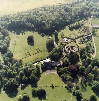 Aerial view of Coulston House, gardens, stables and dovecot, taken from the ENE.