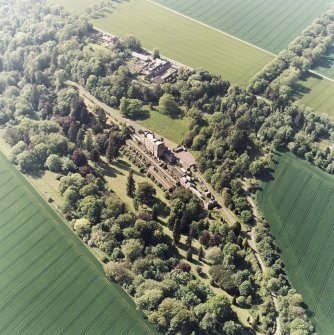 Oblique aerial view. of Biel House, garden, cottages and coach-houses, taken from the SE.
