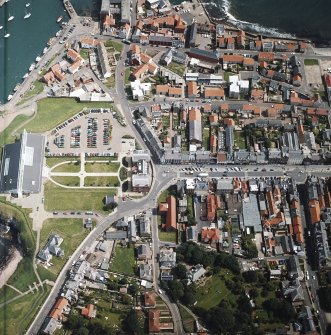 Oblique aerial view centred on the barracks with fishermen's housing at Victoria Place and leisure centre adjacent, taken from the WSW.