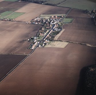 General oblique aerial view centred on the village, taken from the WSW.