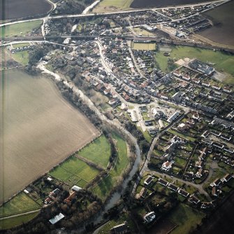 General oblique aerial view of East Linton centred on Prestonkirk House, taken from the NNE.