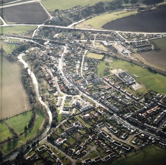 General oblique aerial view of East Linton centred on Prestonkirk House, taken from the N.