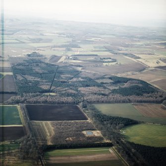 Oblique aerial view centred on Binning Wood, taken from the ENE.