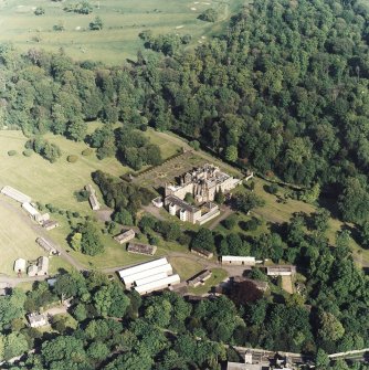 Oblique aerial view of Newbattle Abbey, garden, sundials and military camp, taken from the N.