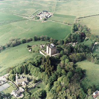 Oblique aerial view of Borthwick Castle and church, taken from the S.