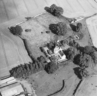 Oblique aerial view centred on the country house with garden adjacent, taken from the WSW.