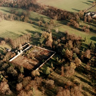 Preston Hall, oblique aerial view, taken from the SW, centred on the formal gardens.