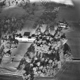 Preston Hall, oblique aerial view, taken from the SSE, centred on the country house with the stables in the top right-hand corner of the photograph.