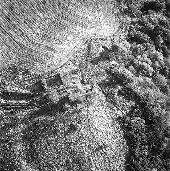 Oblique aerial view of Penicuik, Castle Brae, Uttershill Castle centred on the remains of a tower-house, taken from the N.