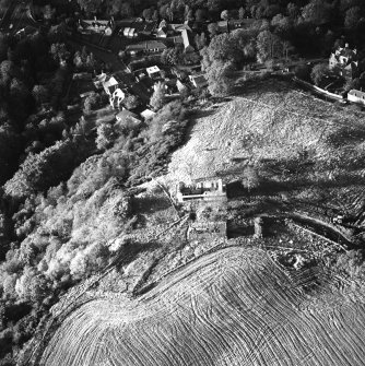 Oblique aerial view of Penicuik, Castle Brae, Uttershill Castle centred on the remains of a tower-house, taken from the S.