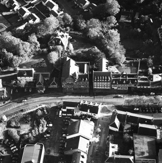 Oblique aerial view of Penicuik, 33 High Street, Cowan Institute centred on office, taken from the NW.