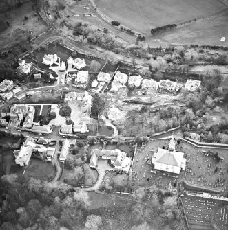 Oblique aerial view centred on Inveresk Gate, church and burial-ground, taken from the NNW.