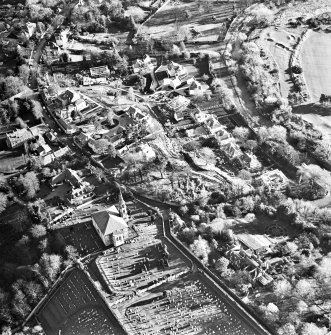 Oblique aerial view centred on Inveresk Gate, church and burial-ground, taken from the WNW.