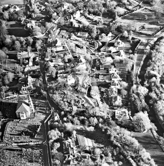 Oblique aerial view centred on Inveresk Gate, church and burial-ground, taken from the W.