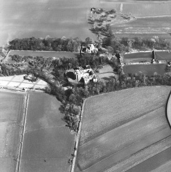 Oblique aerial view of house, garden, Collegiate Church from SW.