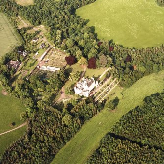 Winston House, oblique aerial view, taken from the WSW, centred on the country house and garden.
