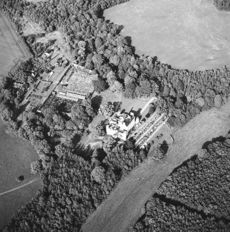 Winston House, oblique aerial view, taken from the SW, centred on the country house and garden.