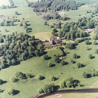 Aerial view of Tyninghame House, the site of Tyninghame manse, St Baldred's Church, the sundial and gardens and the clock tower court, taken from the S.