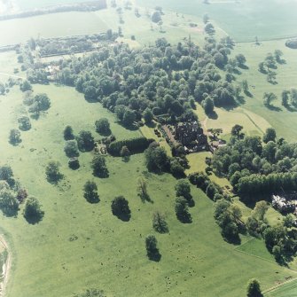 Aerial view of Tyninghame House, the site of Tyninghame manse, St Baldred's church, the clock tower court and the obelisk, taken from ENE.