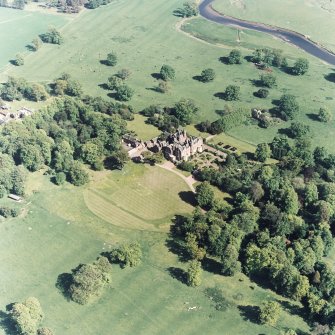 Aerial view of Tyninghame House, the site of Tyninghame manse, St Baldred's church, the sundial and gardens, and the clock tower court, taken from the N.