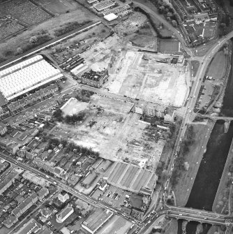 Aerial view of Brunton Ltd wire works, excavation and River Esk bridges, taken from the NE.