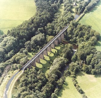 Oblique aerial view of the aqueduct built to carry the Union Canal over the River Avon.
