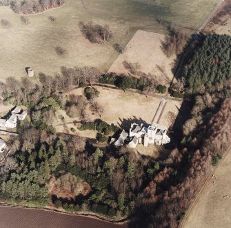 Oblique aerial view taken from the WSW, centred on Wallhouse and a dovecot.
