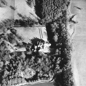 Oblique aerial view, taken from the WSW, centred on the country house.