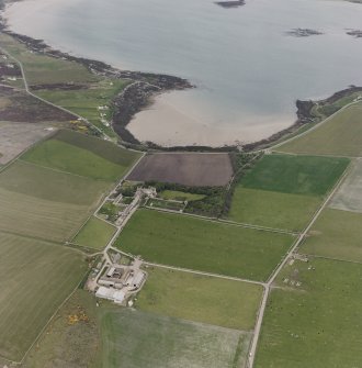 Hoy, oblique aerial view, taken from the SW, centred on Melsetter House, and showing the remains of a military camp in the bottom right-hand corner of the photograph.