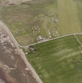 Hoy, Doonatown, oblique aerial view, taken from the ENE, centred on The Garrison Theatre, Lyness Military Headquarters and Camp, and a ruined farmstead.