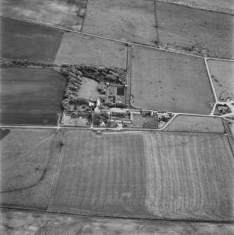 Hoy, oblique aerial view, taken from the NW, centred on Melsetter House, and showing the remains of a military camp in the top right-hand corner of the photograph.