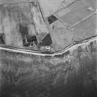 Hoy, Crockness, oblique aerial view, taken from the ENE, centred on the Martello Tower. A curving linear soilmark is visible in the top left hand corner of the photograph.