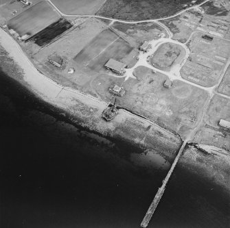 Hoy, Rinnigill, oblique aerial view, taken from the NNW, centred on the crane, and showing Rinnigill Military Camp in the top right hand corner of the photograph.