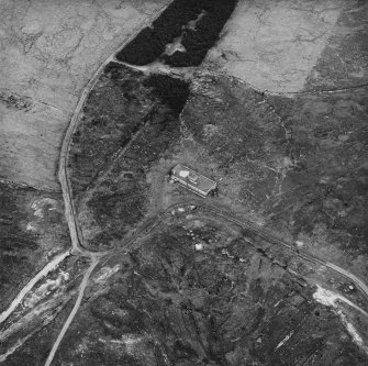 Hoy, Wee Fea, oblique aerial view, taken from the W, centred on the Naval Signal Station, and showing ruined buildings and a water tank in the top half of the photograph.