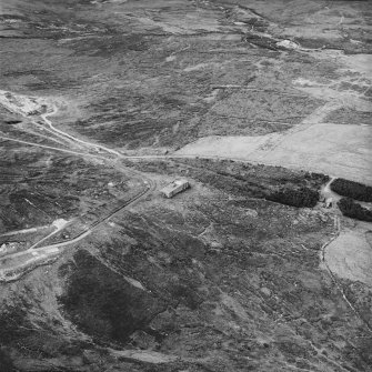 Hoy, Wee Fea, oblique aerial view, taken from the S, centred on the Naval Signal Station, and showing ruined buildings and a water tank in the centre right of the photograph.