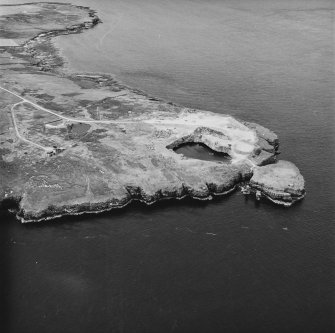 Flotta, Stanger Head, oblique aerial view, taken from the SW, showing the Naval Signal Station in the left half, and the Coast Battery in the right half of the photograph