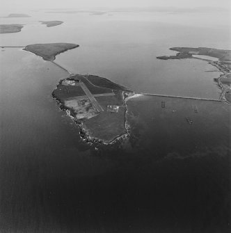 Aerial view, Orkney, Lamb Holm taken from the NE.  Also visible are Churchill Barriers Nos.1 and 2 and in the background the Island of Glimps Holm.