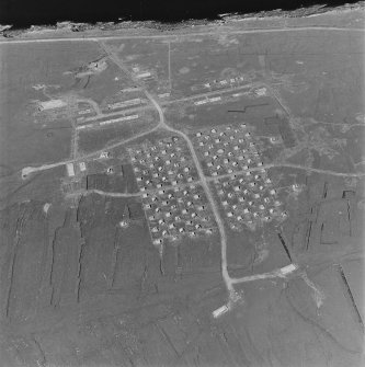 Oblique aerial view of Orkney, Flotta, 'Z' anti-aircraft battery and accommodation camp, taken from the S.