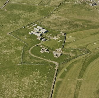 Aerial view of Orkney, Stromness, Ness (World War II) coast battery, gun-emplacements, observation tower and accommodation camp, taken from the SSE.
