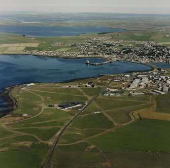 Oblique aerial view from WNW, with Kirkwall in the background.